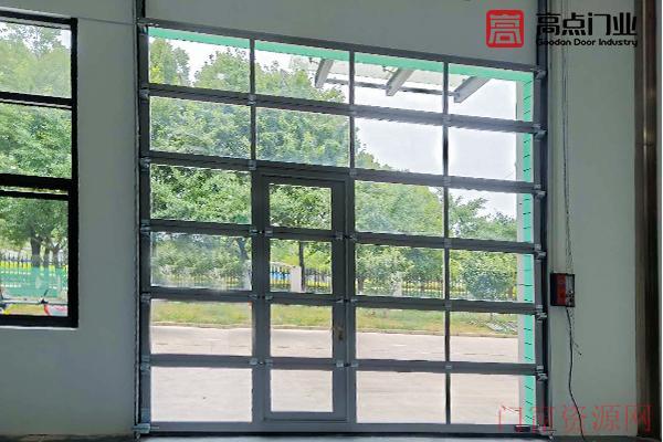 湖州汽车展厅透明电动提升门厂家